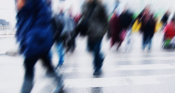 A blurry picture of a crowd of people.